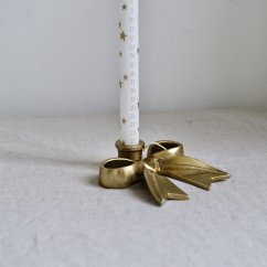 Kovový svícen mašle zlatý