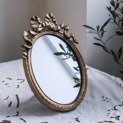 Oválné zdobené zrcadlo 32x21 cm